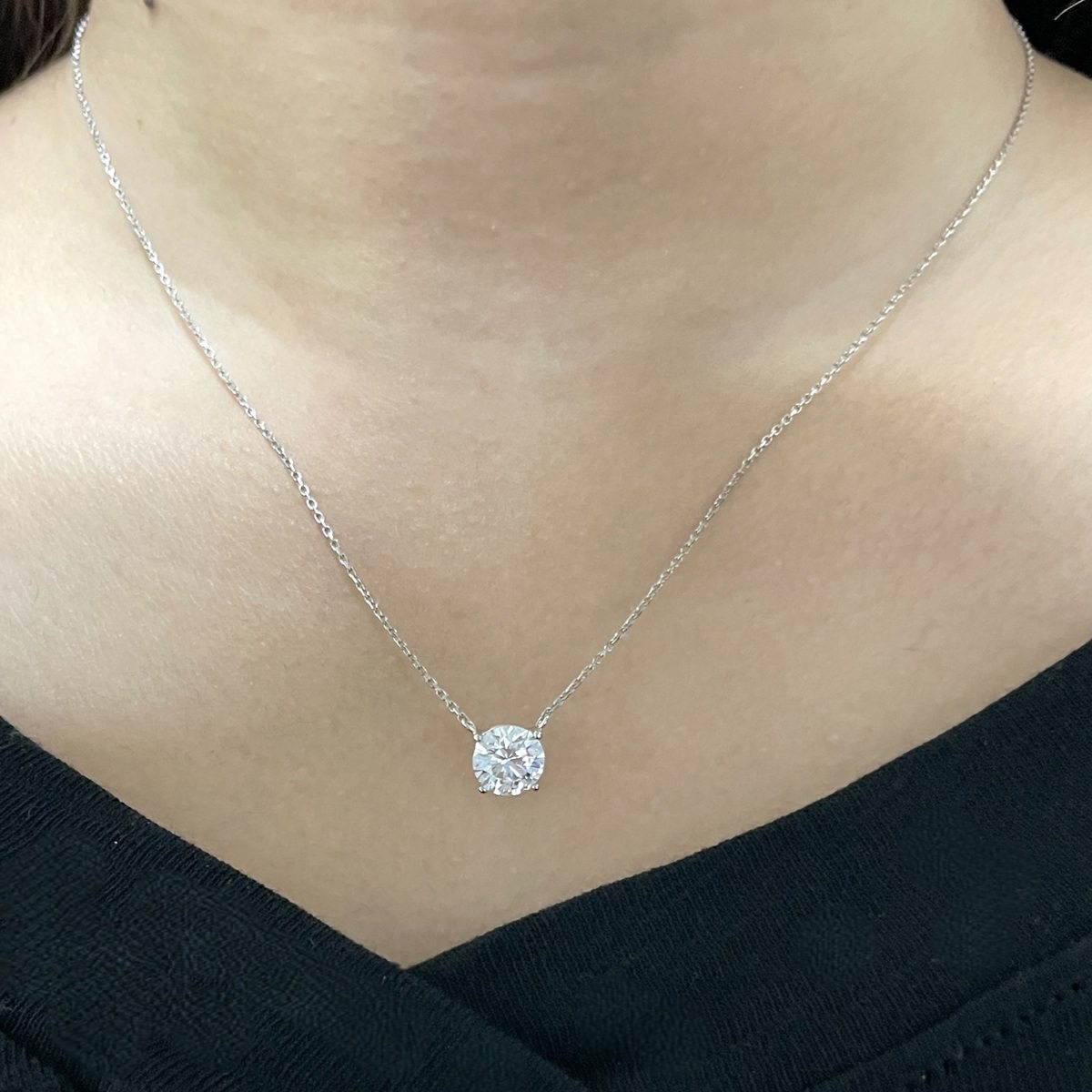 A diamond pendant worn on the neck