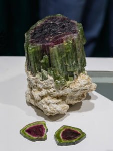 Watermelon tourmaline rough crystal with two slices, from Brazil.