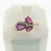 18 K Rose Gold and Pink Sapphire Ring with Diamond Swirl